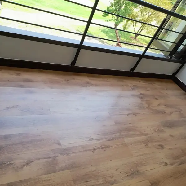 After. Handyman job: finished laminate balcony floor, clean skirting