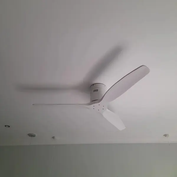 Handyman job: white ceiling fan installed in room, pendant lights
