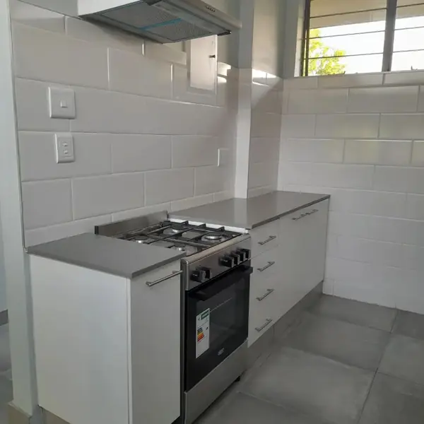 Renovations job: new kitchen with tiles, gas stove